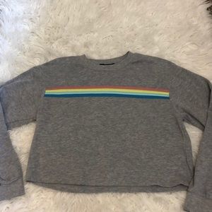 Mostly gray, but with pink, yellow, light blue and dark blue striped at the top